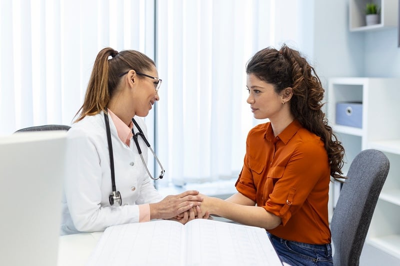 Doctor consulting with patient